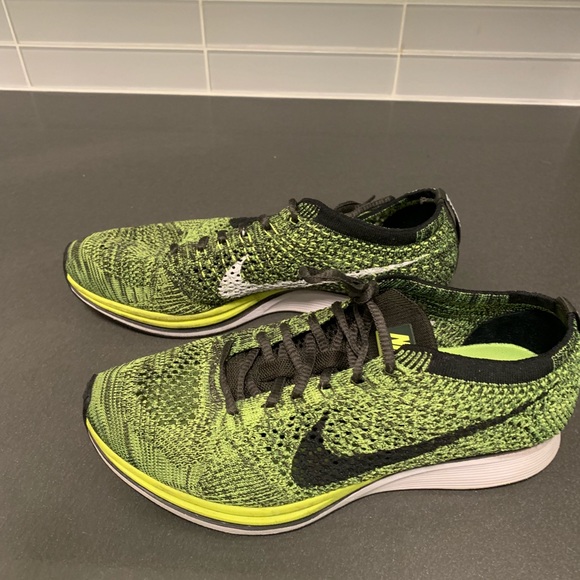 black and neon yellow nike shoes